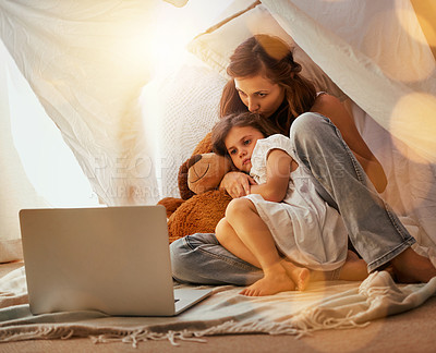 Buy stock photo Laptop, movie and mom with child in tent for watching cartoon, streaming show and videos. Family, fairy lights and mother with girl and teddy bear on computer for bonding, relax and love in bedroom