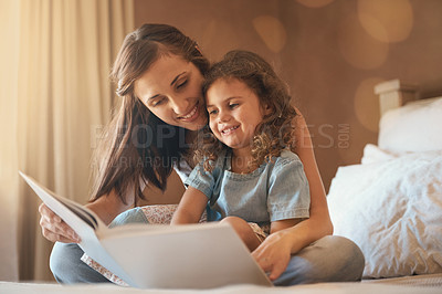 Buy stock photo Bed, mother and child with book, smile and bonding for story, education and learning in home. Reading, woman and girl in bedroom for storytelling, happy and relax with care, growth and development