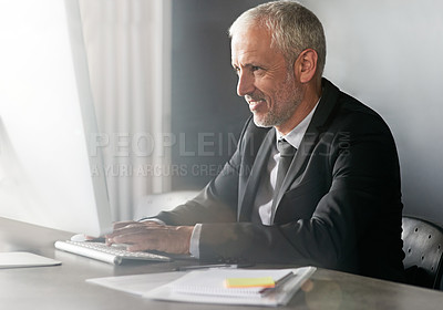 Buy stock photo Cropped shot of a handsome mature businessman in corporate attire