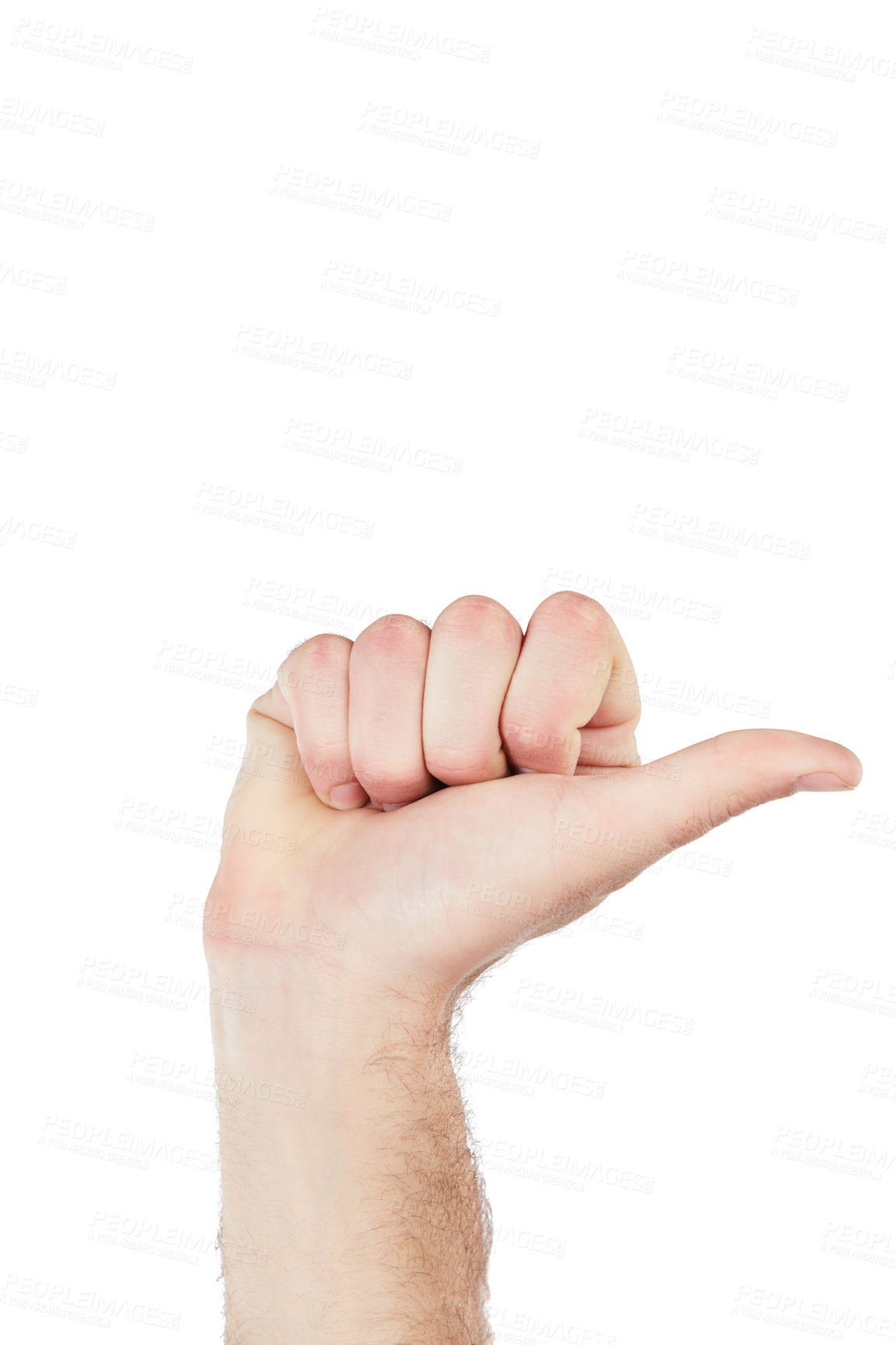 Buy stock photo Hand, communication and man thumb pointing in a studio for sign language, direction or counting. Finger, body language and man with a hand gesture isolated by a white background with mockup space.