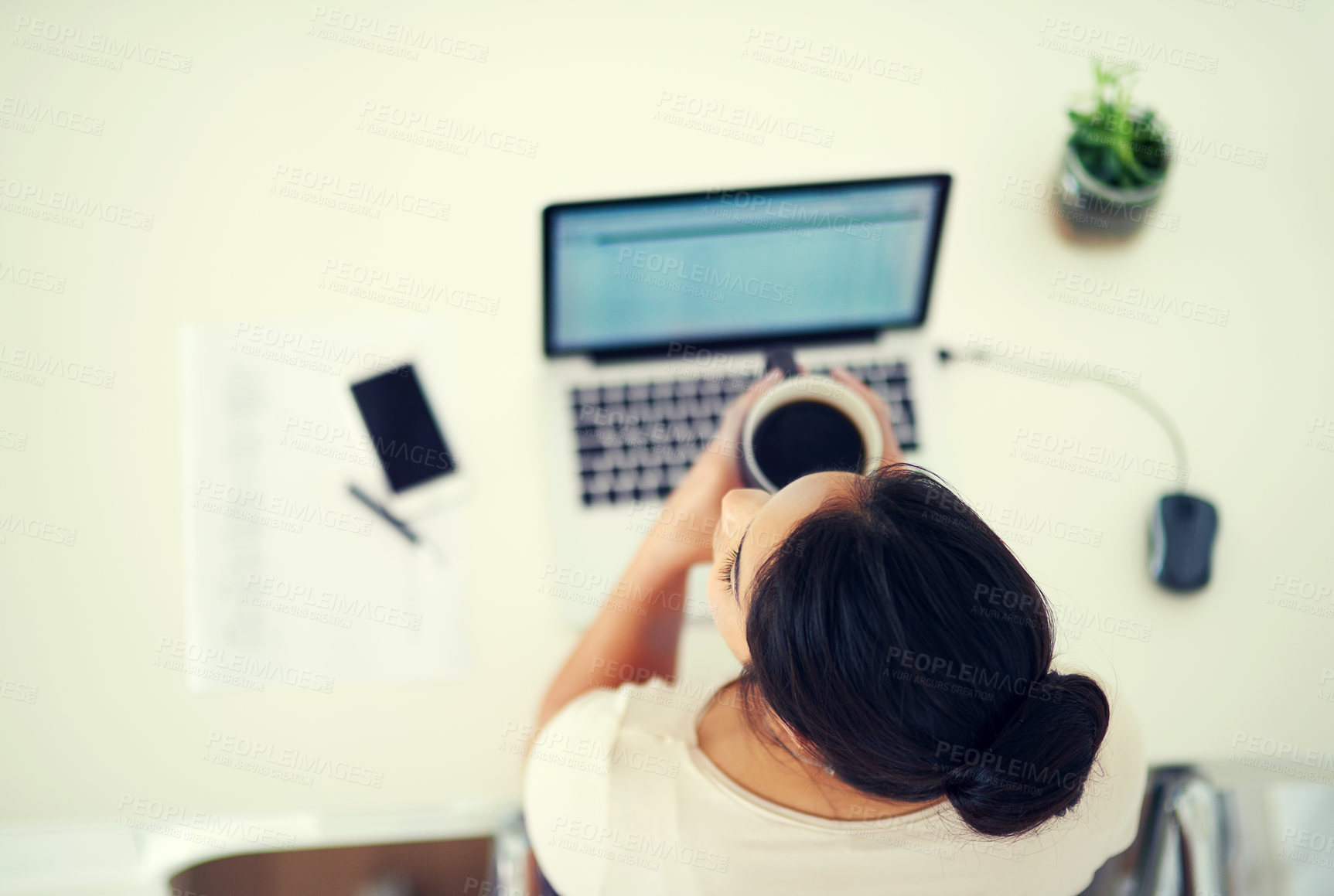 Buy stock photo Woman, laptop and above in office for coffee, planning and employee for digital report or proposal. Female person, top view and drink espresso for project management, thinking and web for research