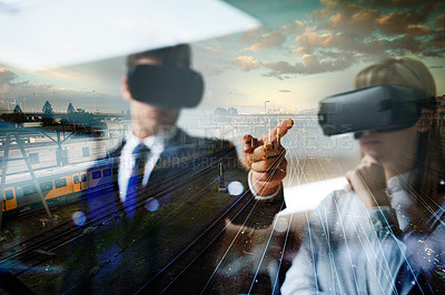 Buy stock photo Business people, VR and train station overlay, futuristic and digital streaming. Hand, technology and virtual planning for building with man and woman, cyber and internet for property development