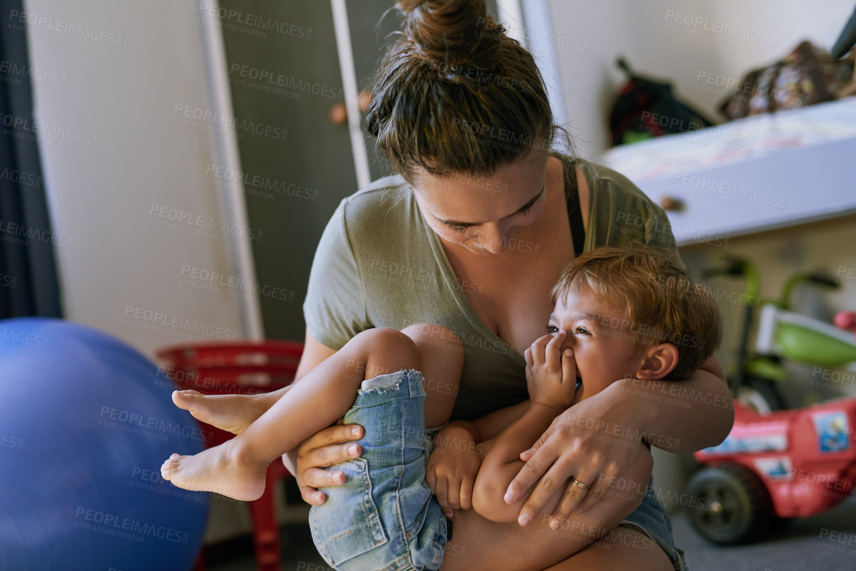 Buy stock photo Mother, boy and playful with laugh in home with hug, care and smile in morning with bonding for memory. Woman, mom and child with embrace, funny and love with connection at family house in Madrid