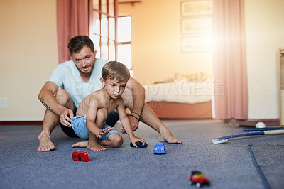 Buy stock photo Shot of a father bonding wth his son