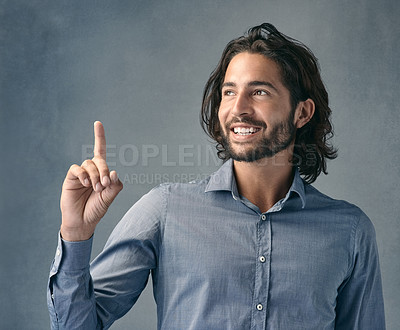 Buy stock photo Studio, idea and business man with pointing for announcement, promotion and smile with pride. Professional career, sales assistant and hand gesture for marketing deal, thinking and gray background