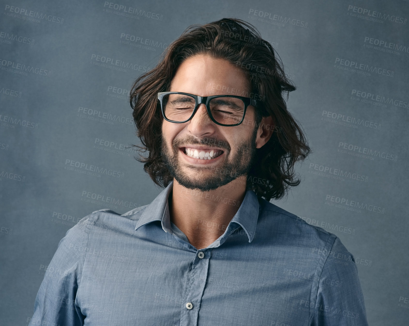 Buy stock photo Man, studio or eyes closed with teeth clench for expectation with glasses, happy or excited with hope. Male person, gray background or anticipation for waiting on result, announcement or notification