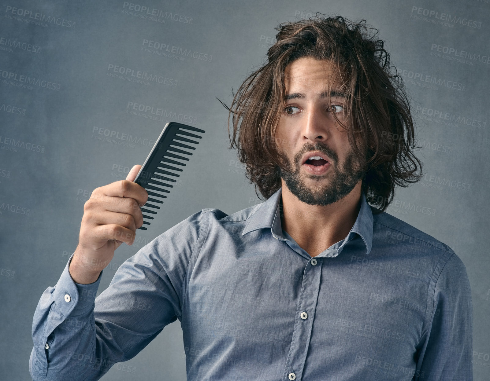 Buy stock photo Man, studio and shock with brush and hair loss and beauty on gray background. Stress, aging and wow for male person and grooming, alopecia and comb for surprise and wtf with messy hairstyle