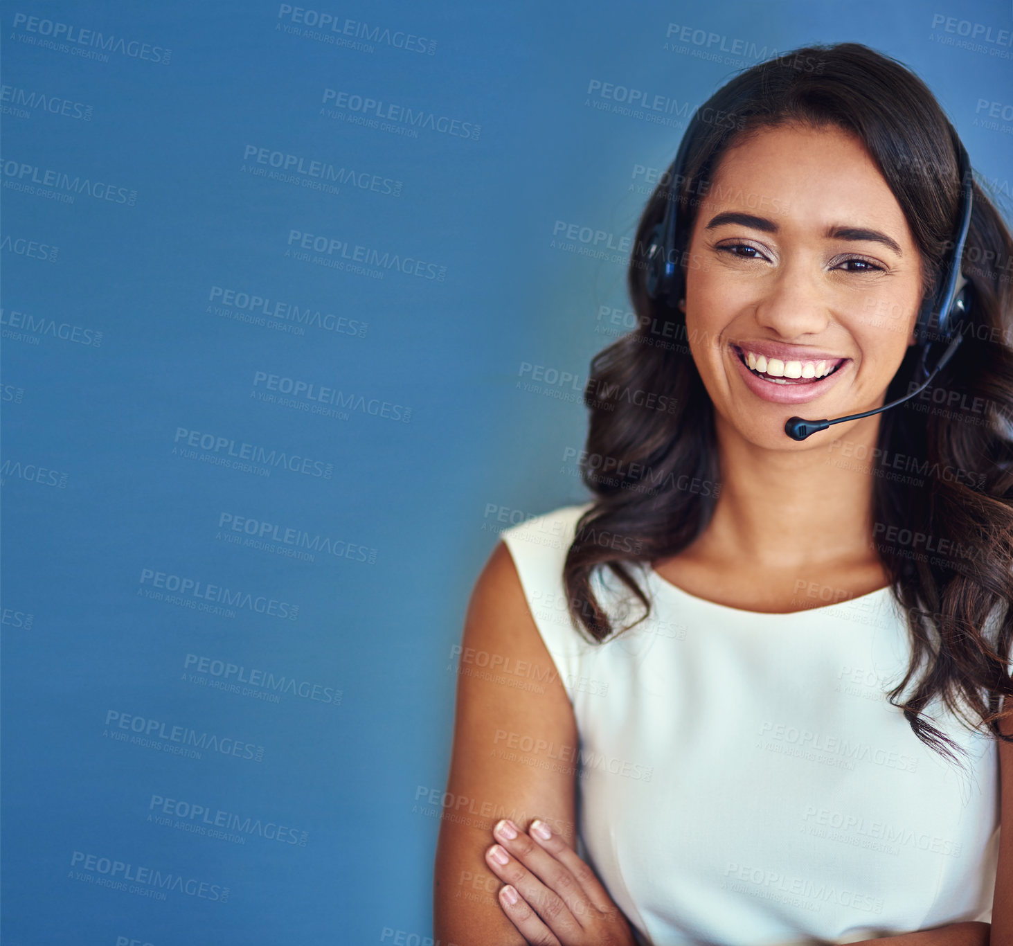 Buy stock photo Call center, portrait and businesswoman in studio with confidence, telemarketing and customer service. Mockup, female agent and headset for listening, hearing and support for faq by blue background