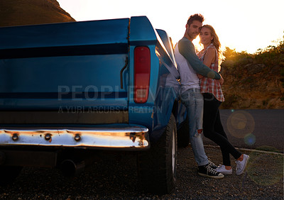 Buy stock photo Couple, portrait and sunset by pickup truck for road trip with love, romance or date on adventure, travel or journey. Man, woman and hug for care, mockup and transportation for outdoor in countryside