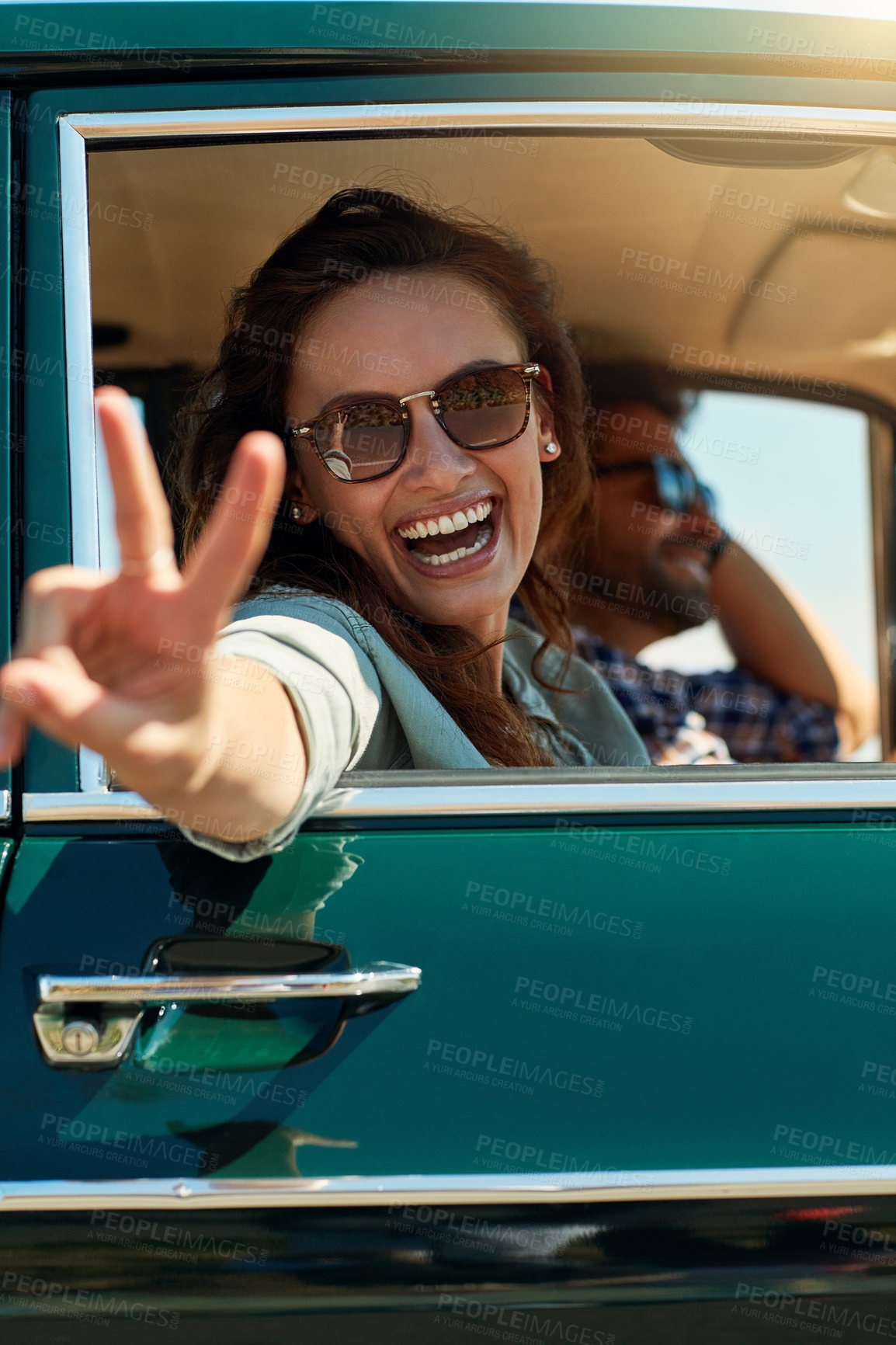 Buy stock photo Road trip, girl and peace sign in car for travel, adventure and vacation journey to Mexico. Transport, vehicle and happy woman with hand gesture as reaction, driver and partner with sunglasses