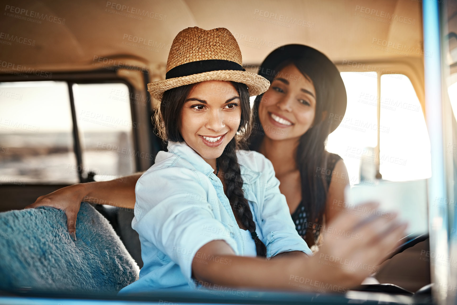 Buy stock photo Woman, friends and travel selfie in van for fun, smartphone and social media post on vacation road trip in summer. Profile picture, happy memory and smiling on weekend adventure, journey and capture
