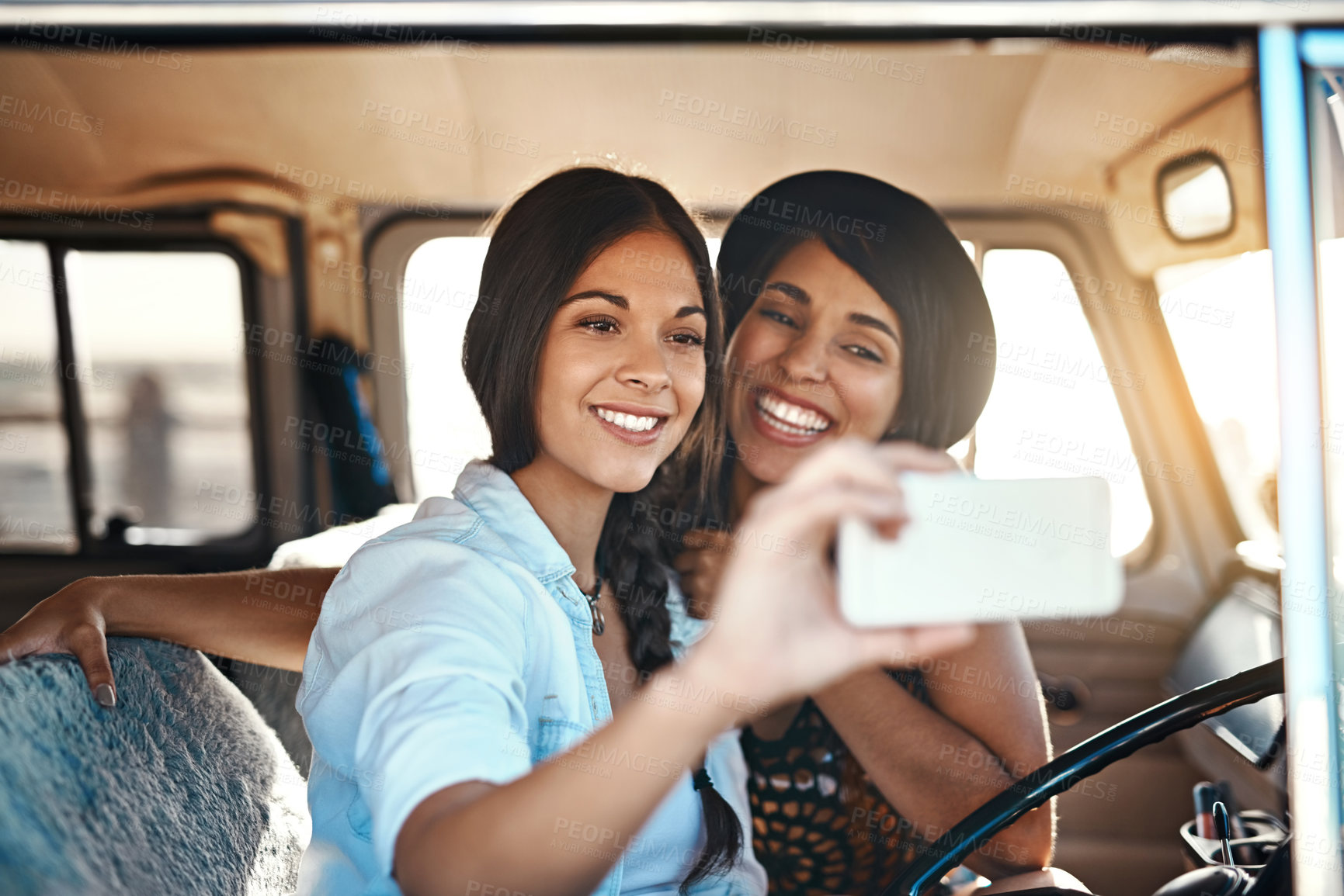 Buy stock photo Woman, friends and selfie in van for holiday for fun, smartphone and social media post on road trip in summer. Profile picture, happy memory and smiling on weekend adventure, journey and capture