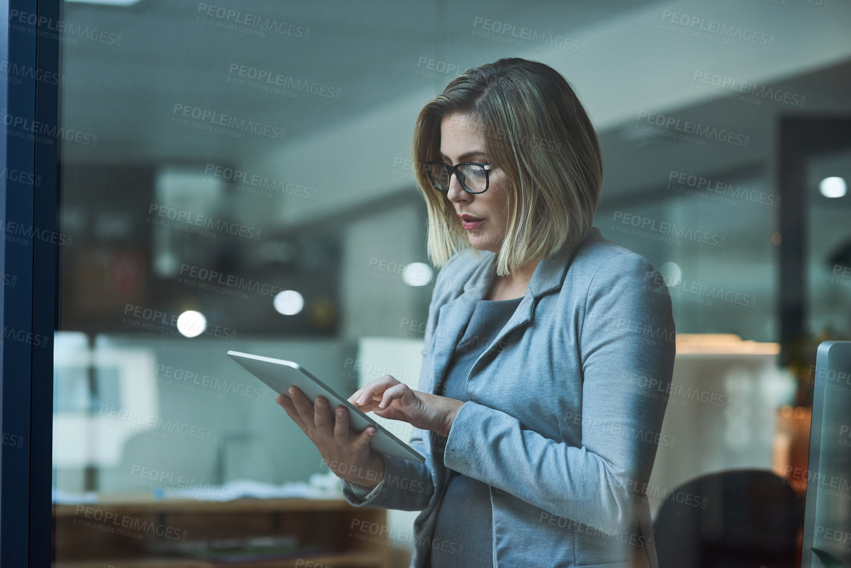 Buy stock photo Woman, office and tablet with typing, email for deadline as web designer in digital agency or communications. Female person, business and working on tech for connection as professional for company