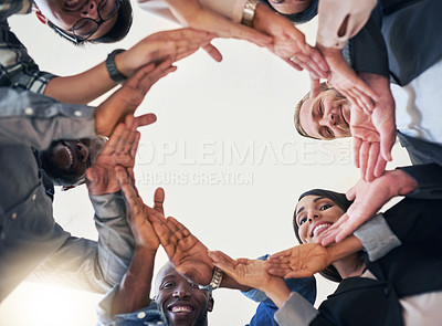 Buy stock photo Business people, hands and circle in solidarity in office for community support, teamwork and collaboration for success. Group, low angle and together for creative project, diversity and partnership.