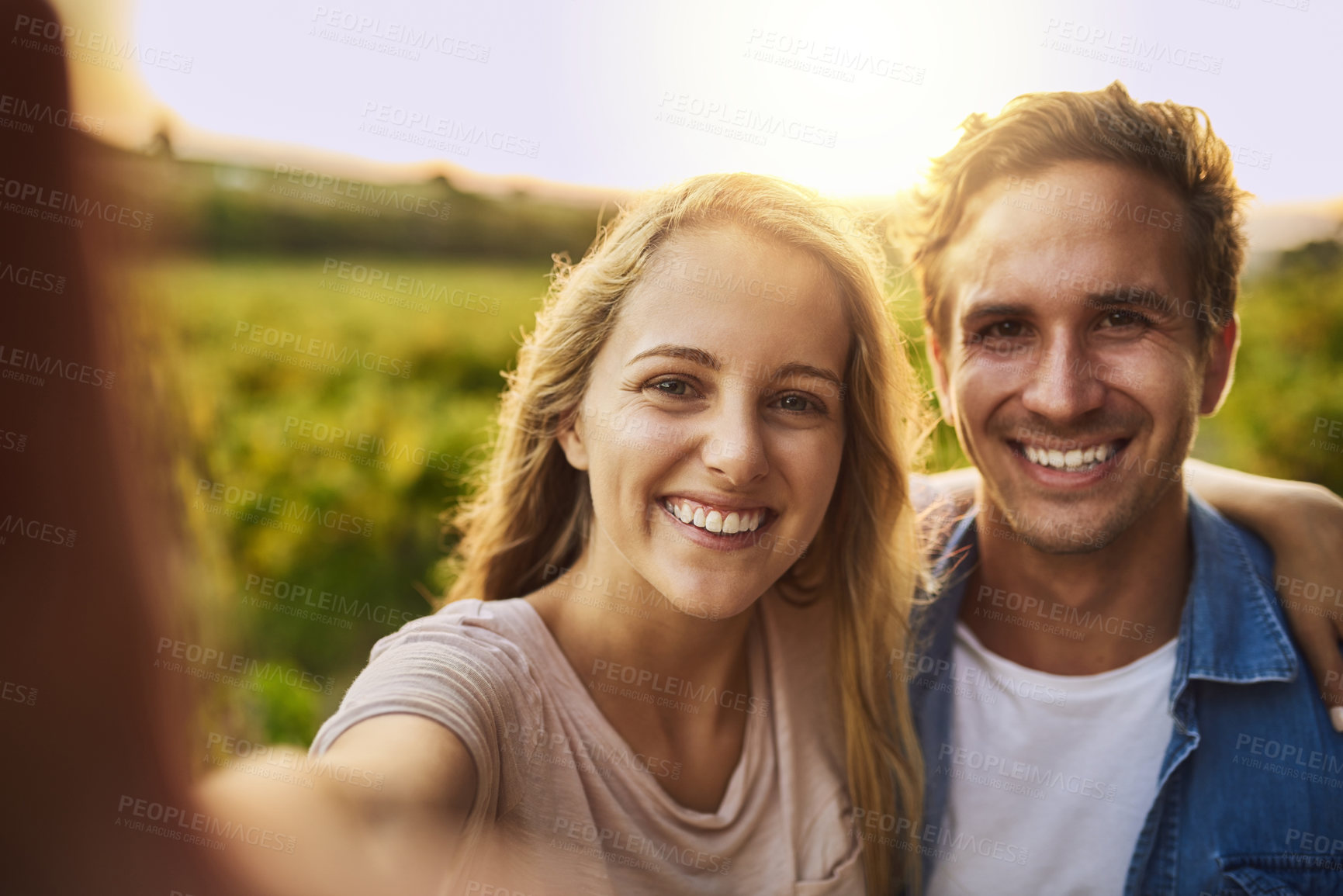 Buy stock photo Couple, portrait and selfie on farm outdoor for agriculture, sustainable farming and happy for harvest season with post. Man, woman and photography on land for environment, memory and personal blog.