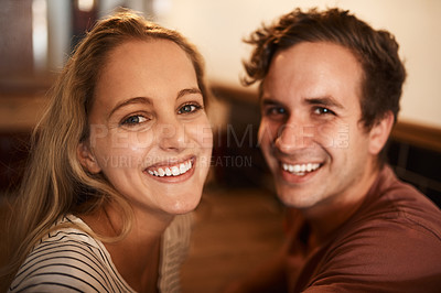 Buy stock photo Portrait of a happy young couple spending time together at a cafe
