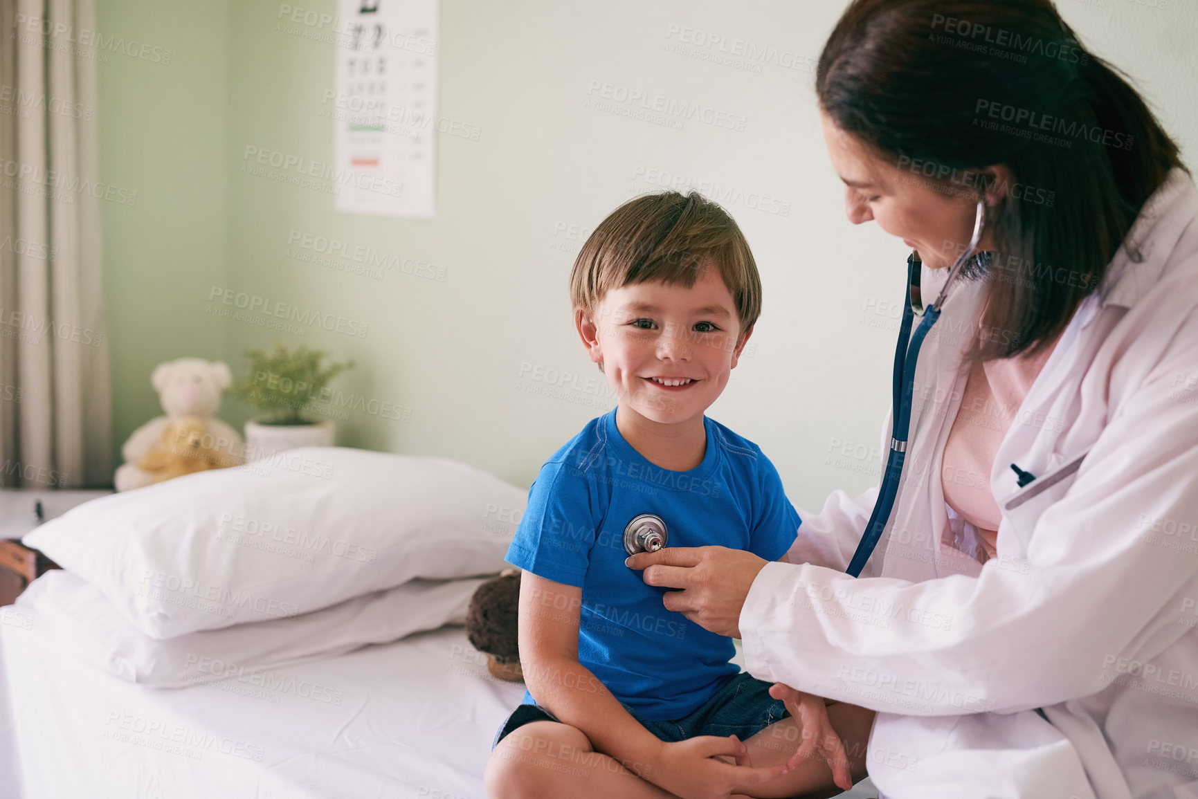 Buy stock photo Doctor, stethoscope and child in hospital for healthcare, health and wellness with medical exam. Female pediatrician, assessment and patient in clinic for heart, lungs and cardiology with portrait