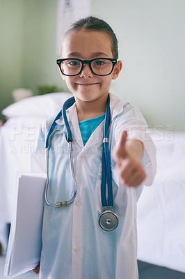 Buy stock photo Girl child, playing and doctor thumbs up in portrait with smile, glasses and stethoscope in hospital. Female kid, play medic and happy with excited face, learning and hand sign for yes emoji in house