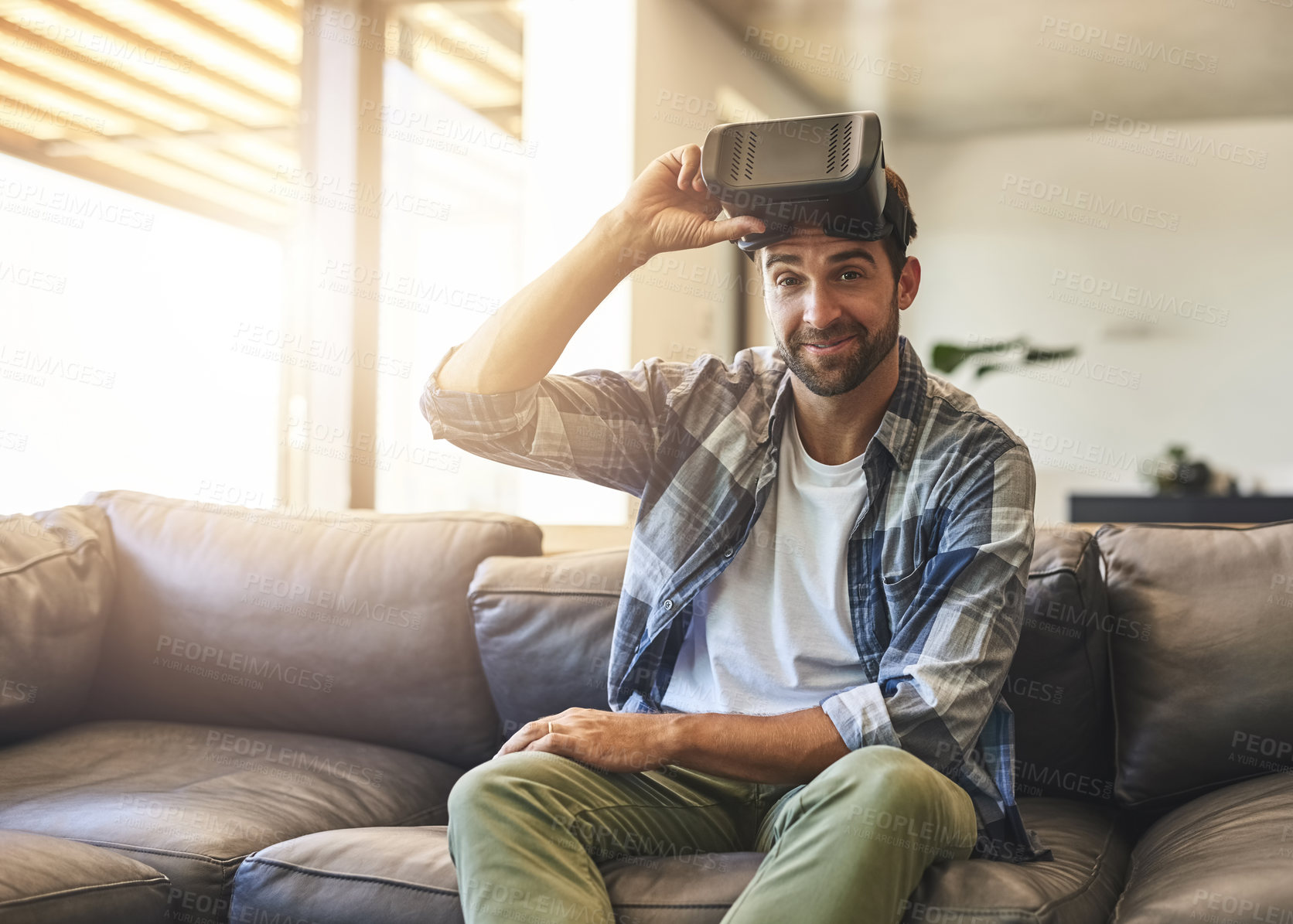Buy stock photo Sofa, man and VR headset in home lounge of cyber experience, metaverse system or gaming connection. 
Gamer, virtual reality and games break in living room with future, innovation and ui technology