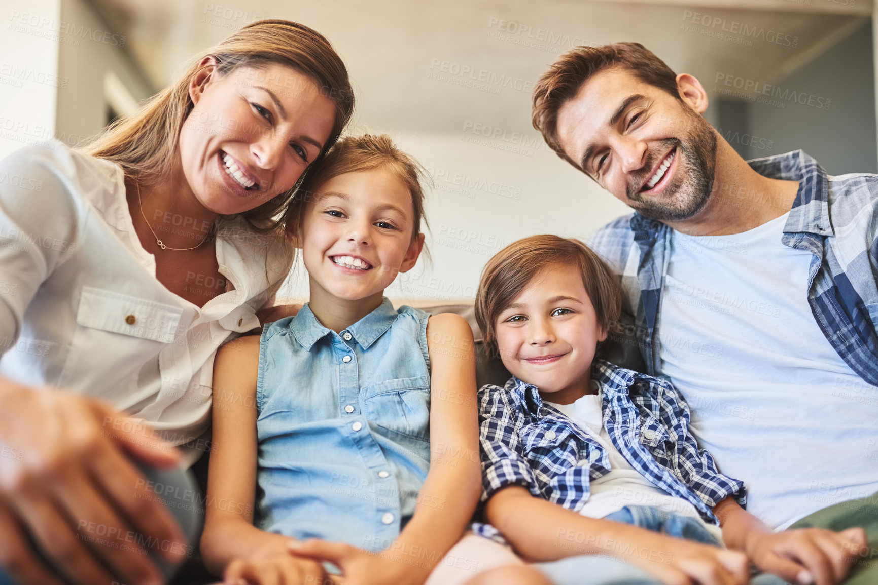 Buy stock photo Love, portrait and smile with family in living room of home together for bonding, relationship or relax. Safety, security or trust with mother, father and kids in apartment for child development