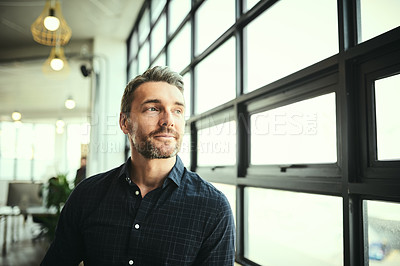 Buy stock photo Thinking, ideas and face of man at office window, creative startup and business project for entrepreneur at design agency. Boss with creativity, job idea and focus, businessman with plan in workplace