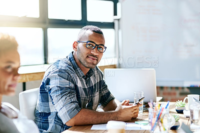 Buy stock photo Portrait of a businessman sitting in a meeting in the boardroom