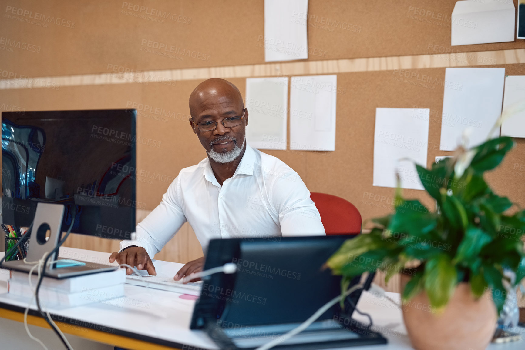 Buy stock photo Black man, mature and computer as entrepreneur, ceo and management in construction company or small business, Male person, tech and typing for email, supplier or employees for project or development