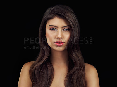 Buy stock photo Studio shot of a beautiful woman pouting her lips posing against a black background