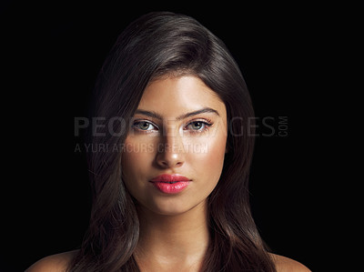 Buy stock photo Studio close up shot of a beautiful woman posing against a black background