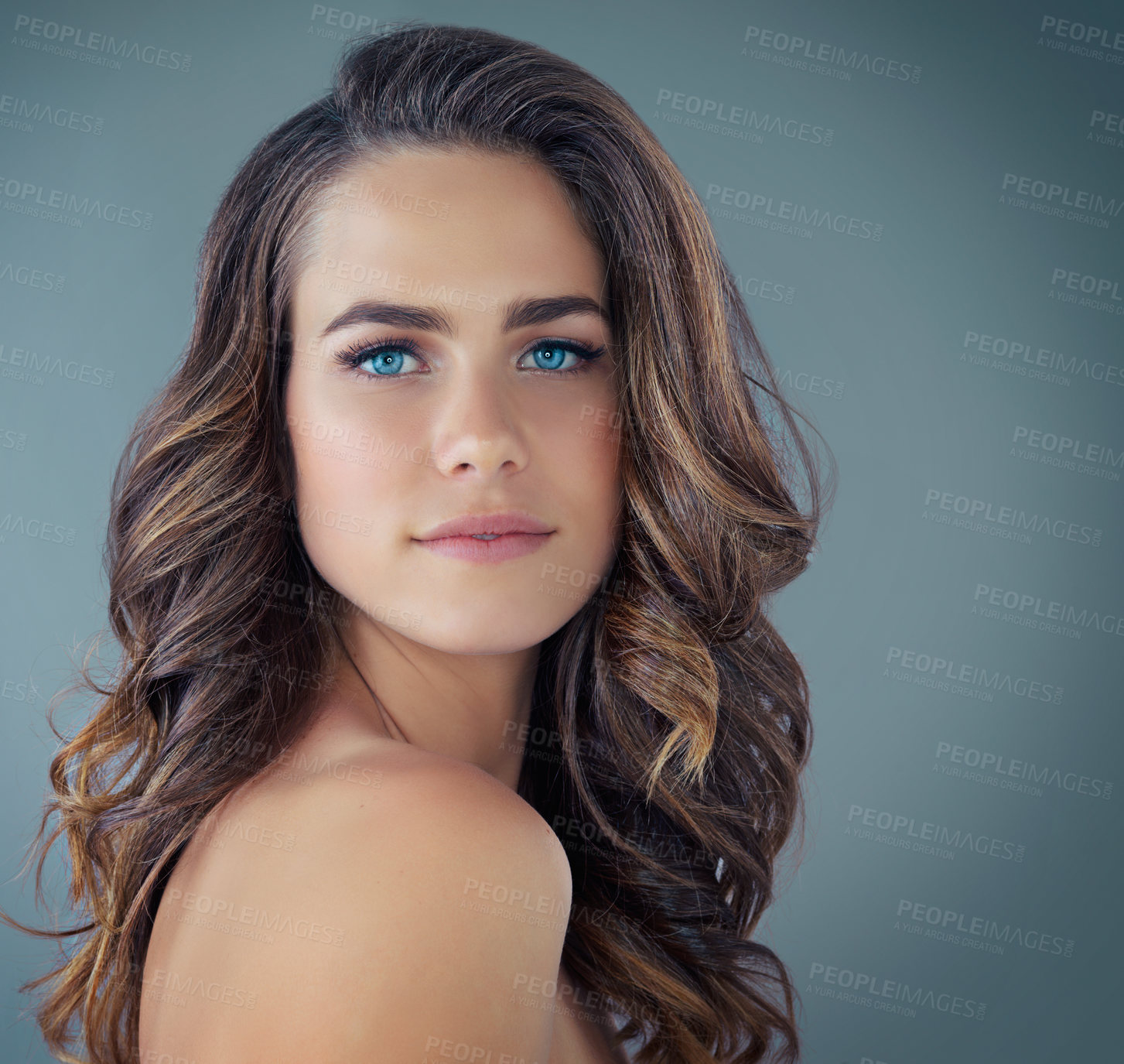 Buy stock photo Portrait, hair care and woman with shampoo, cosmetics and texture on grey studio background. Face, person and model with glow, keratin and salon treatment with dermatology, aesthetic or healthy scalp