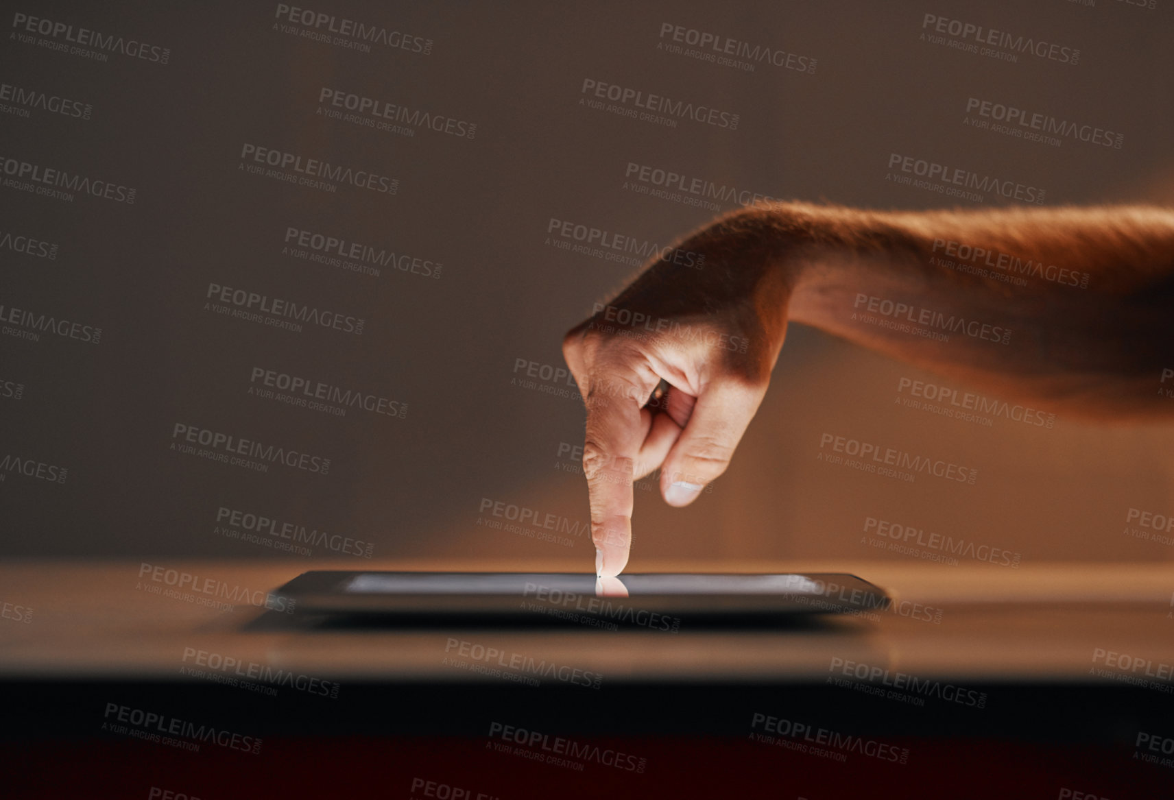 Buy stock photo Cropped shot of an unrecognizable person using a digital tablet