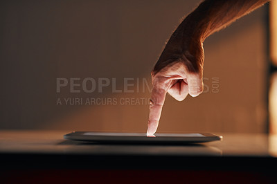 Buy stock photo Cropped shot of an unrecognizable person using a digital tablet