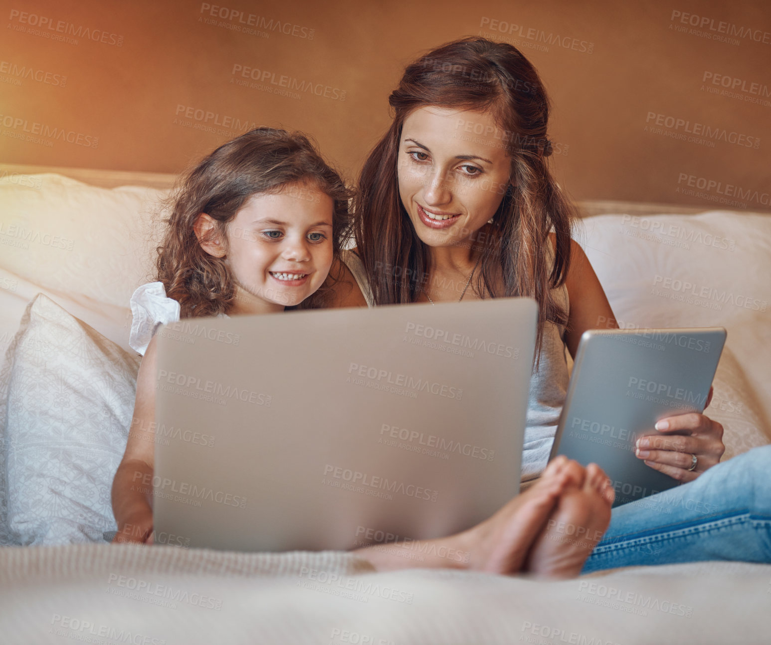 Buy stock photo Mother, kid and tablet on bed with laptop for streaming subscription, cartoon and online video in home. Happy family, woman and girl in bedroom with technology for social media, bonding or child film