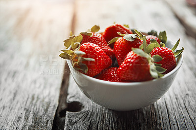 Buy stock photo Strawberry, bowl and table with food and fruit salad for wellness, nutrition and to lose weight. Home, breakfast and sustainable meal or health snack with vitamin A and diet dessert for eating