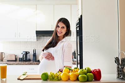 Buy stock photo Shot of a young pregnant woman at home