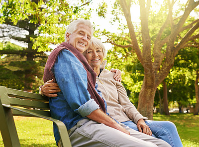 Buy stock photo Old couple hug in portrait, relax in the park with smile, happiness together with bonding in nature, love and retirement. Happy, man and woman with travel, relationship with marriage and commitment