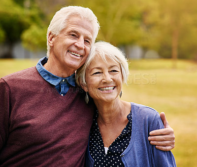 Buy stock photo Old couple hug, outdoor in the park and smile, happiness together with bonding in nature, love and retirement. Happy, man and woman with travel, relationship with trust in marriage and commitment