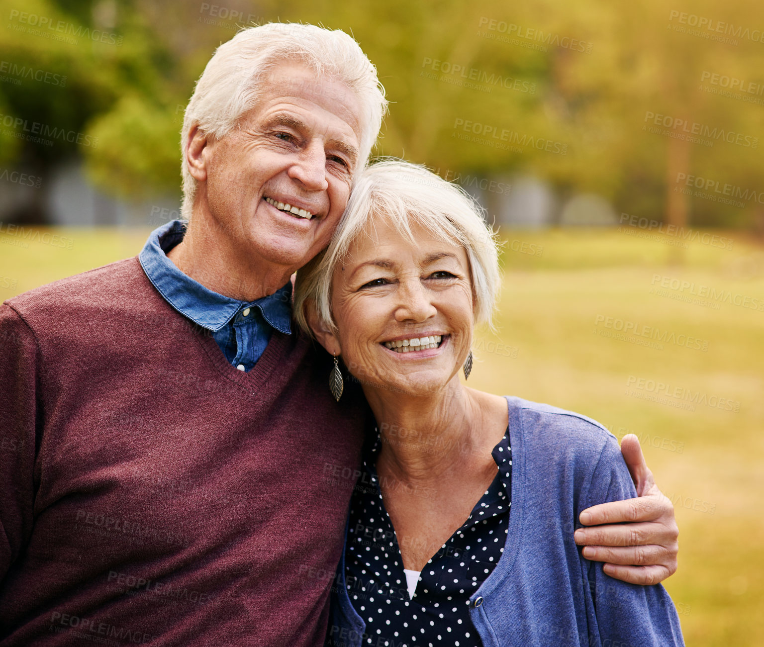 Buy stock photo Old couple hug, outdoor in the park and smile, happiness together with bonding in nature, love and retirement. Happy, man and woman with travel, relationship with trust in marriage and commitment