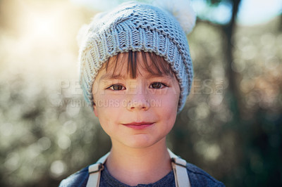 Buy stock photo Portrait of an adorable little boy playing outside