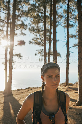 Buy stock photo Portrait of a young woman out on a hike in the forest