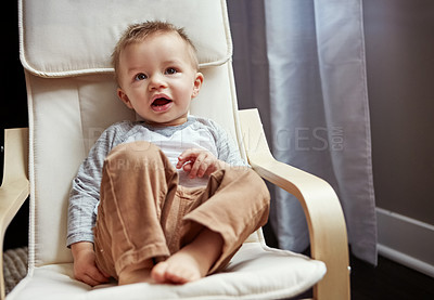 Buy stock photo Shot of a cute little baby boy at home