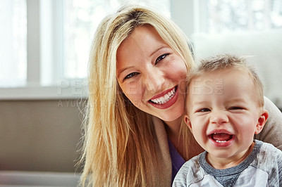 Buy stock photo Closeup shot of a young woman spending the day at home with her little boy