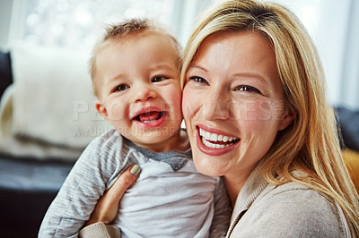 Buy stock photo Mother, baby and smile in house with hug or happiness for motherhood, growth or wellness of child. Toddler, woman and excited in home for care, support and bonding together with love, relax and mom