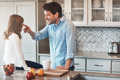 Buy stock photo Father, girl and nose touch in kitchen for joke, love and support for relationship in home. Daddy, daughter and together for care or play game, conversation and bonding in family house for comedy