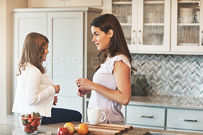 Buy stock photo Counter, mother and chat with girl, kitchen or bonding in weekend, house and kid with smile. Home, child and mom with daughter, talking and together in morning, peace or happiness in apartment