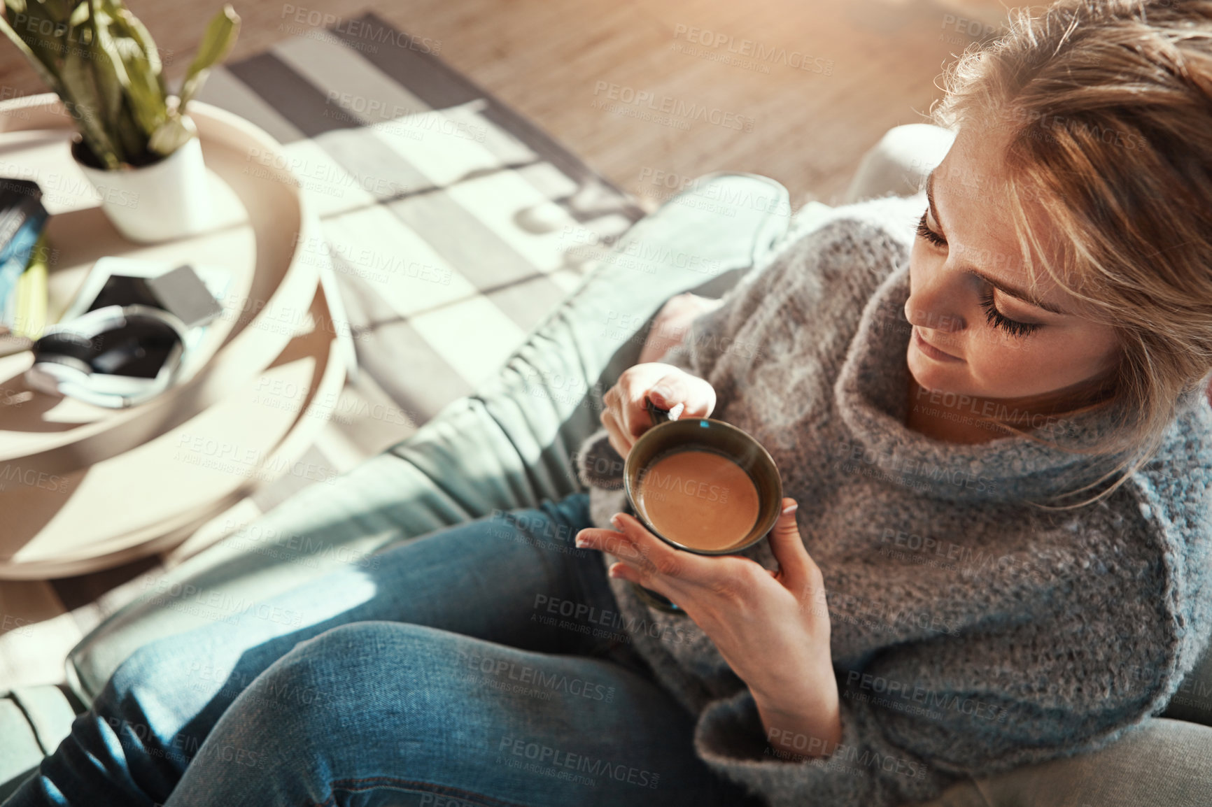 Buy stock photo Woman, coffee and calm on sofa in living room for peace and relaxing quality time. Female, drinking warm tea and thinking for lifestyle wellness vision, morning routine and rest on couch in home 