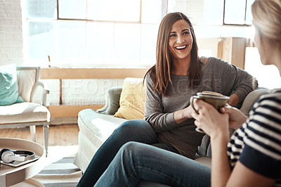 Buy stock photo Happy woman, friends and talking with coffee on sofa for catch up, social or bonding in living room at home. Young female person with smile for morning, drink or conversation in friendship at house