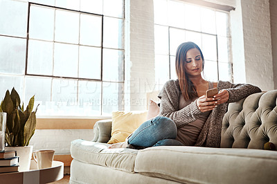 Buy stock photo Home, relax and woman with phone on sofa for social media, communication and connectivity. Living room, female person and network with tech on weekend for internet, online update and reading message