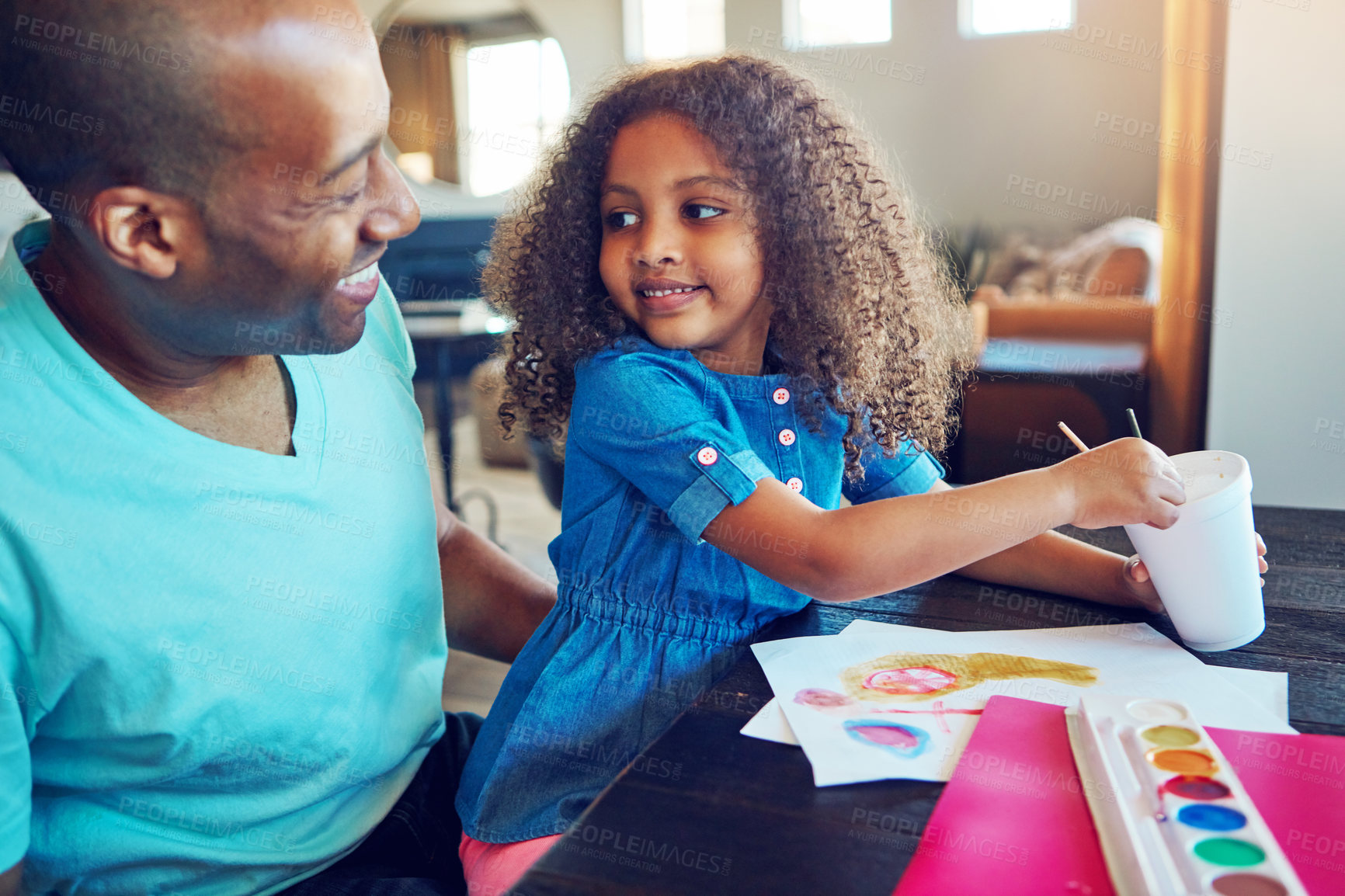 Buy stock photo Black family, dad and girl with painting for homework in home for education, learning and support with care. Man, school work and happy parent teaching for child development, art and creativity