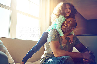 Buy stock photo Happy, man and child with hug on sofa in living room for support, care and gratitude on fathers day. Playful, black family and dad with little girl at home for weekend, bonding and love in childhood